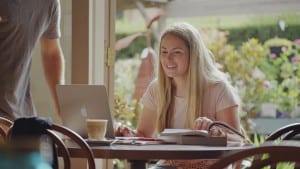 girl in cafe with laptop