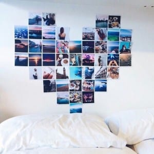 photos arranged in a collage on wall