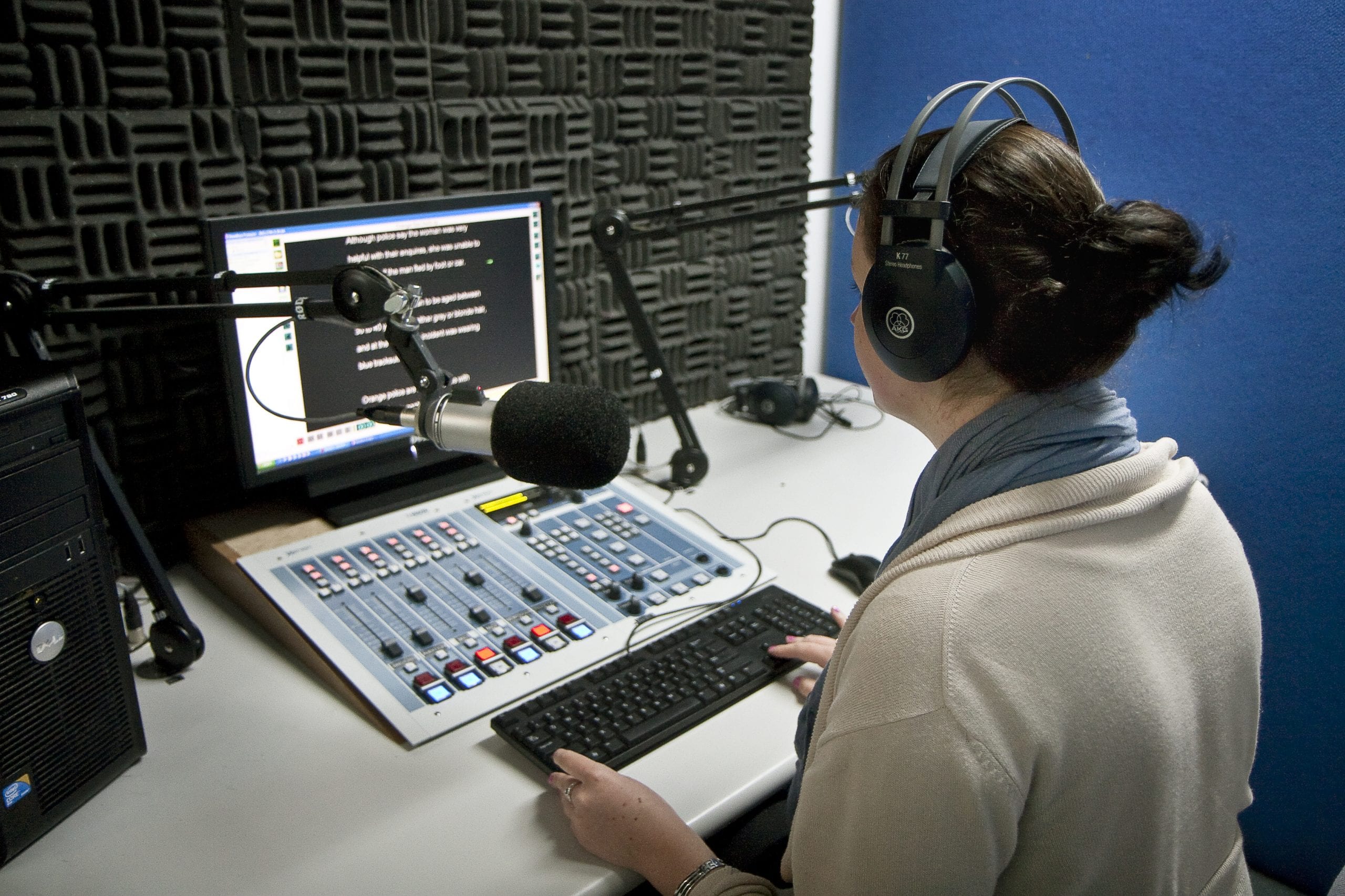 student in radio newsroom