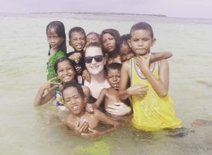 Catreena Kuhn and local children