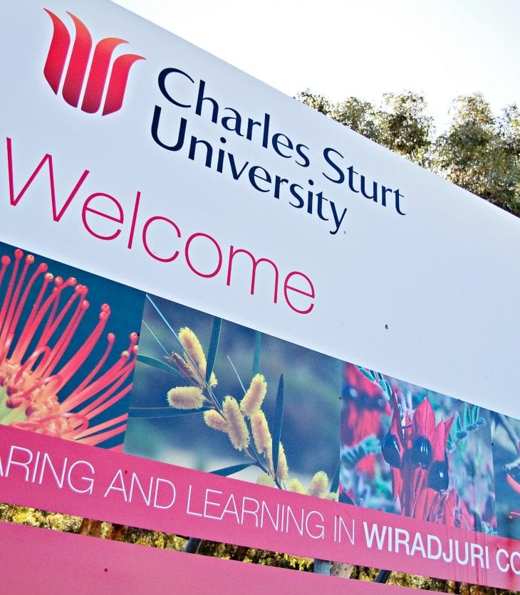 Charles Sturt University sign out the front of campus.