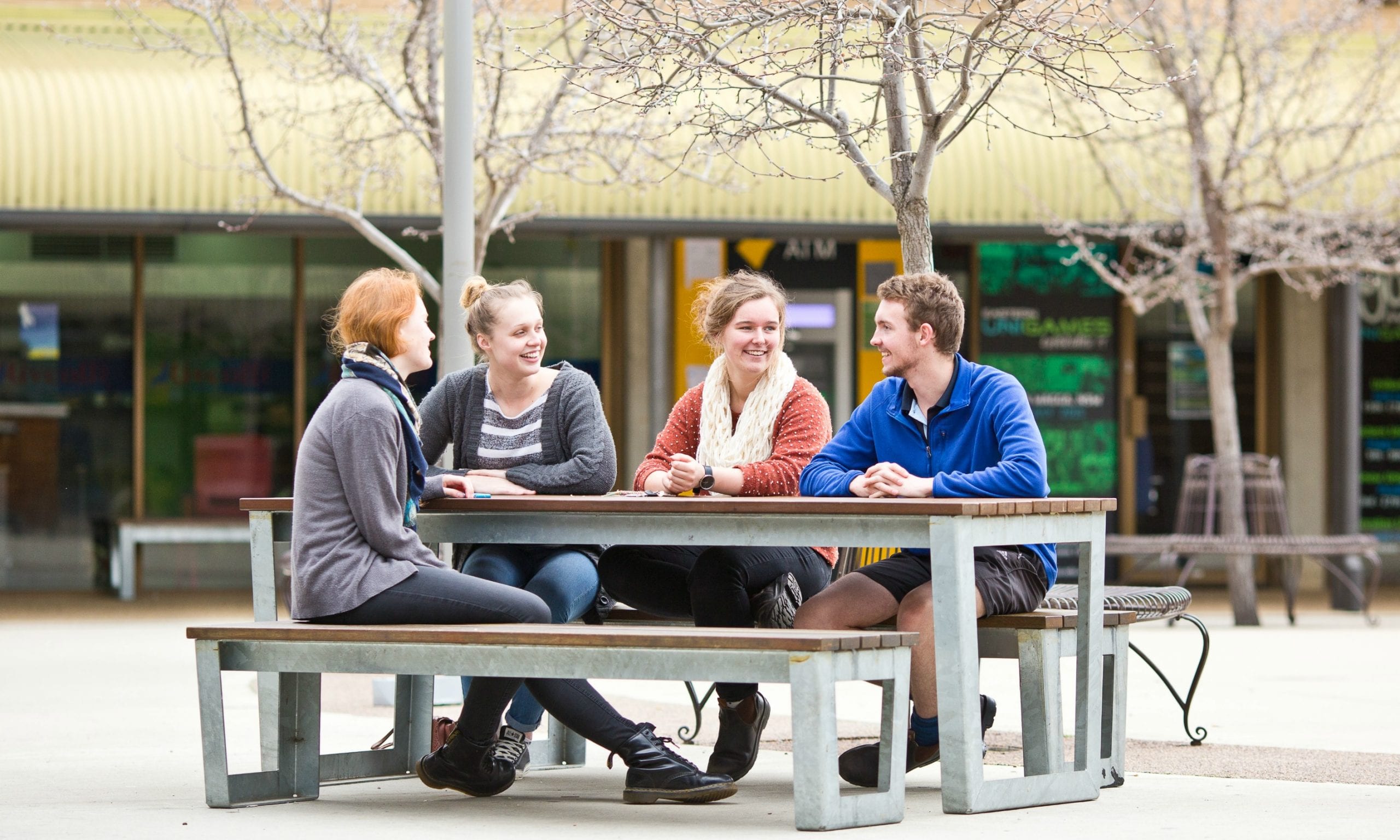 CSU students in Wagga Wagga sit and eat in the cafe eating area.