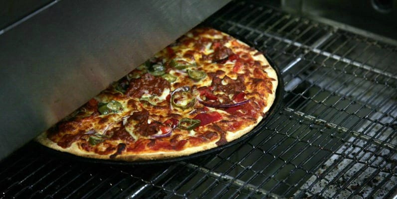 Pizza fresh out of the oven at Bonettis Pizzeria