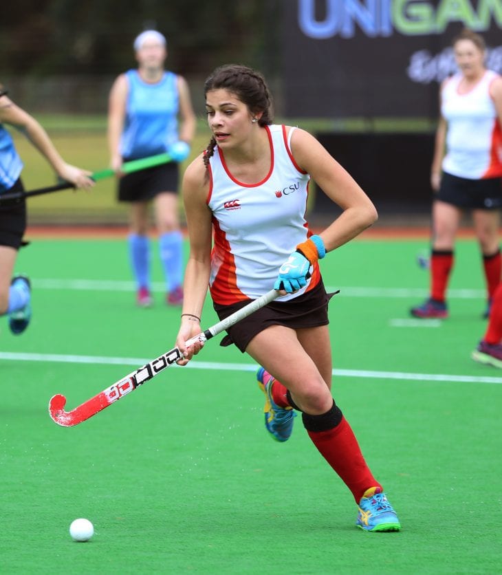 CSU student hockey player in the middle of a game at the Eastern University Games 2016