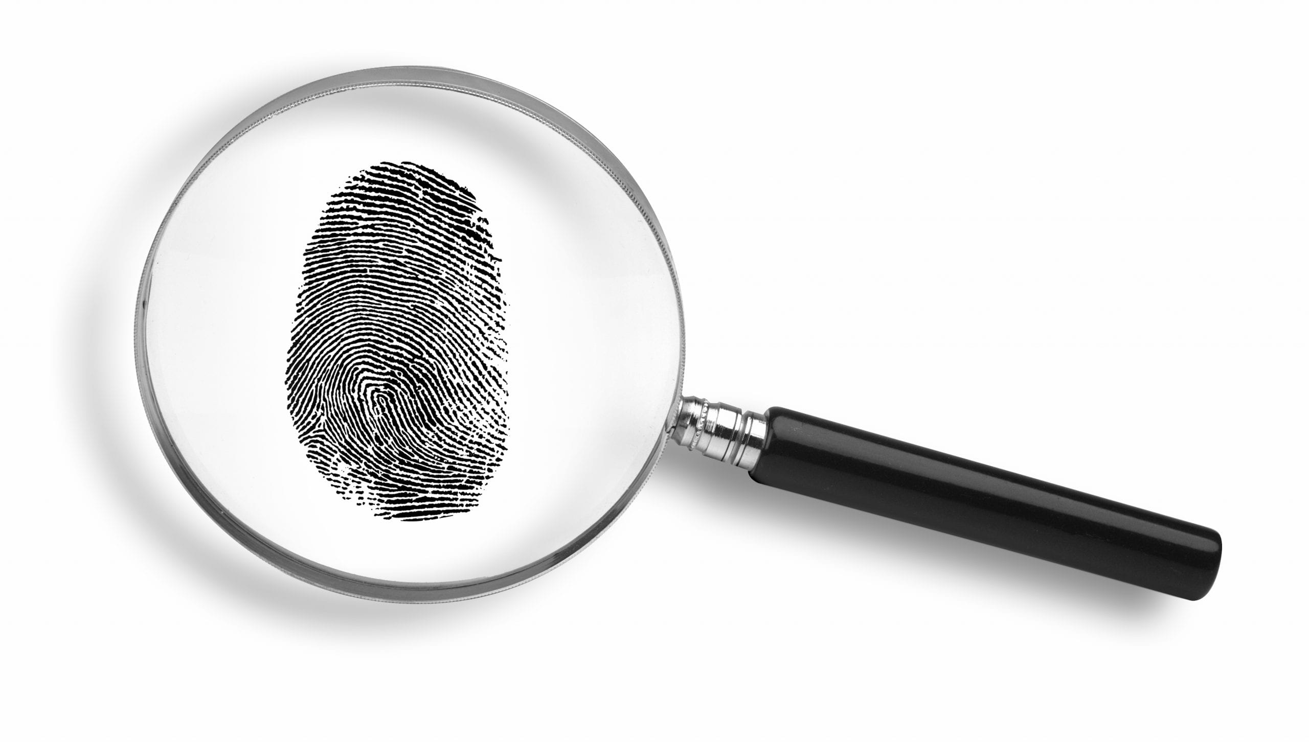 Magnifying glass and thumb print on white background.