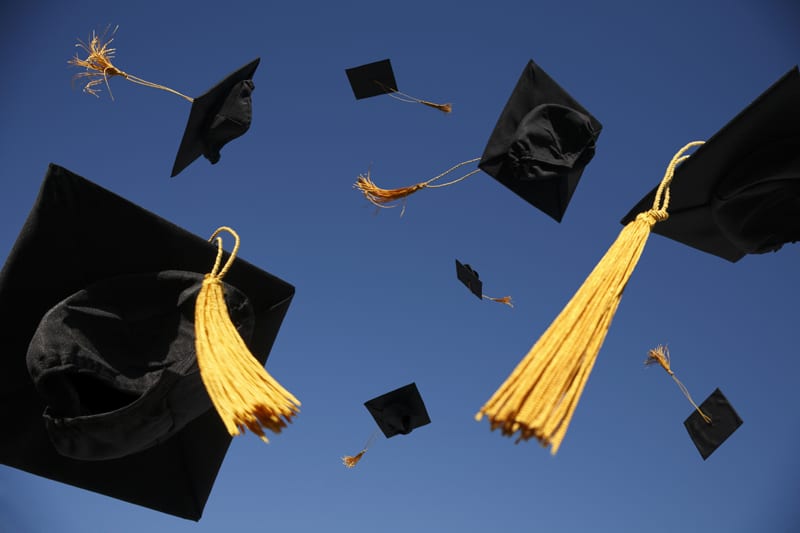 mortarboards in the air