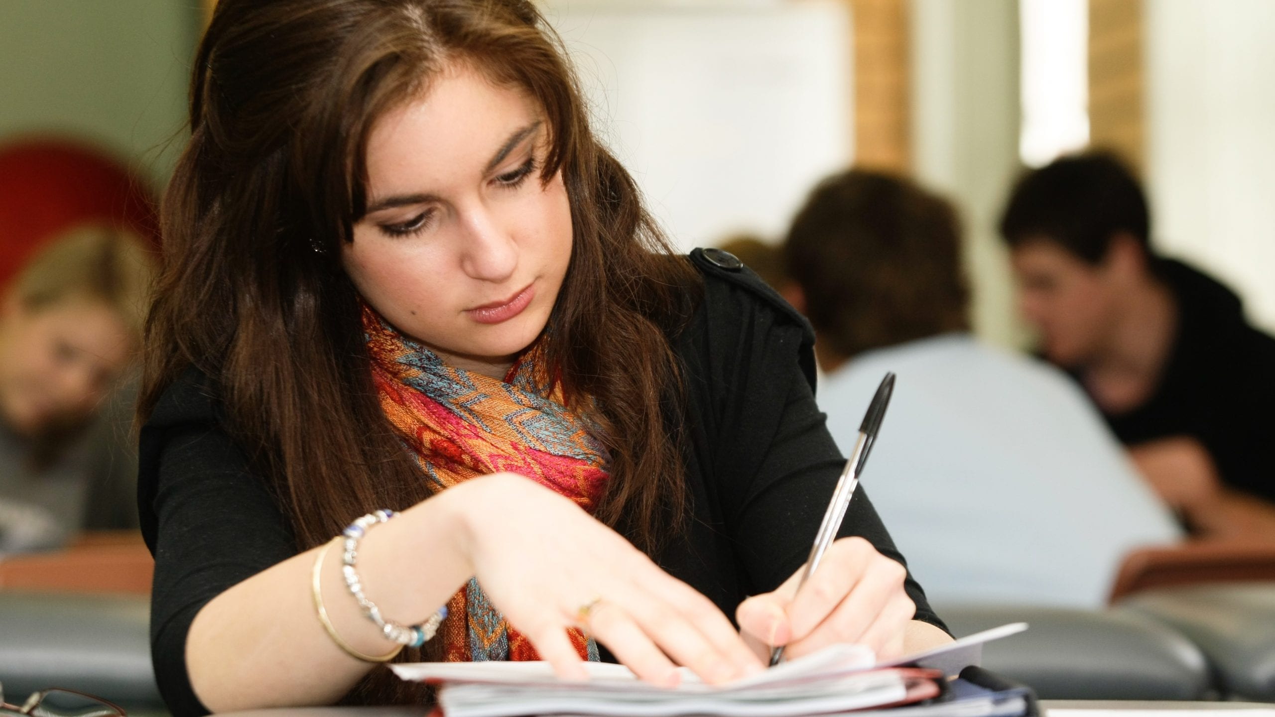 Female student sitting exam