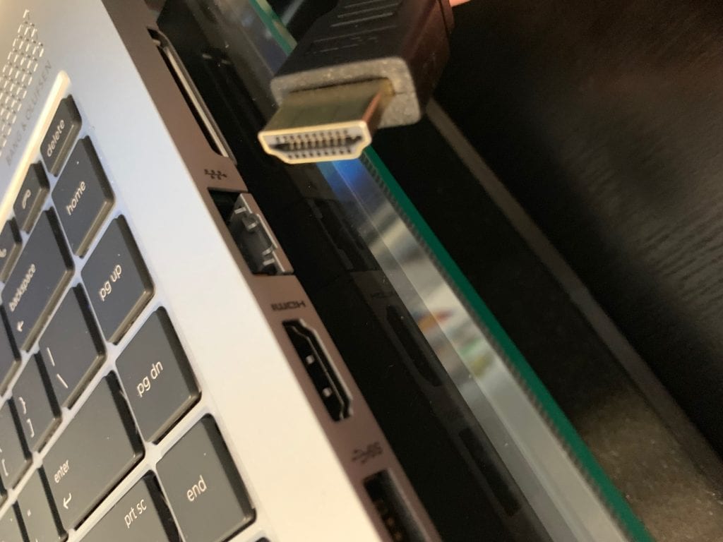 HDMI cable and port on a laptop