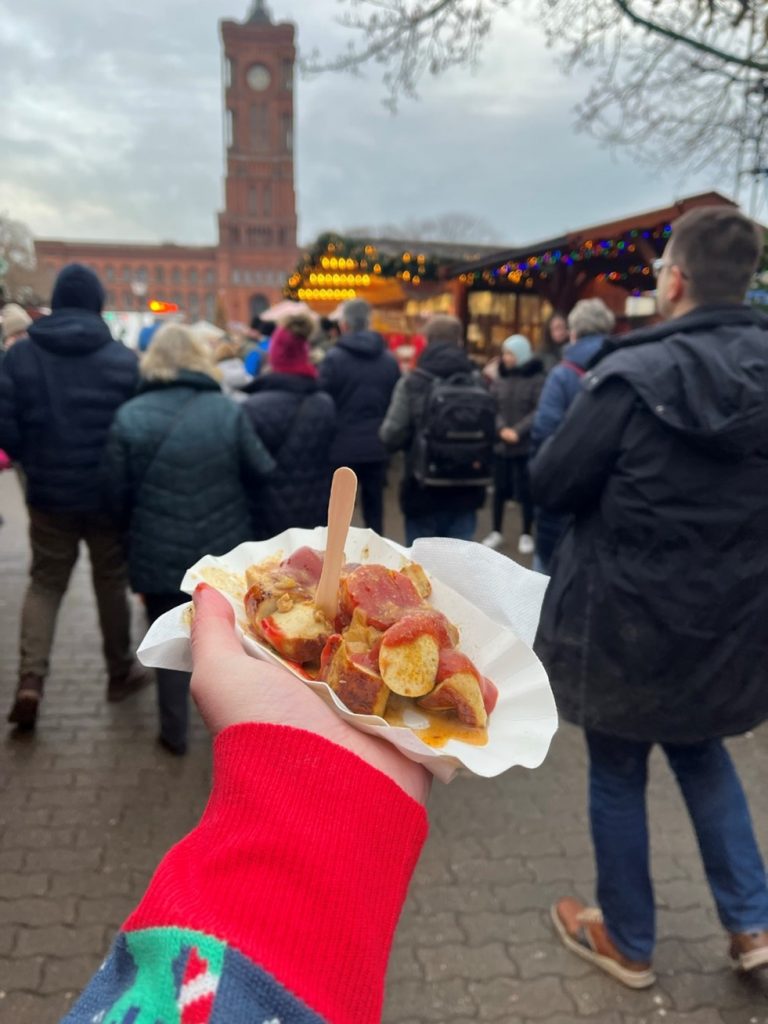 Mikayla trying Currywurst.