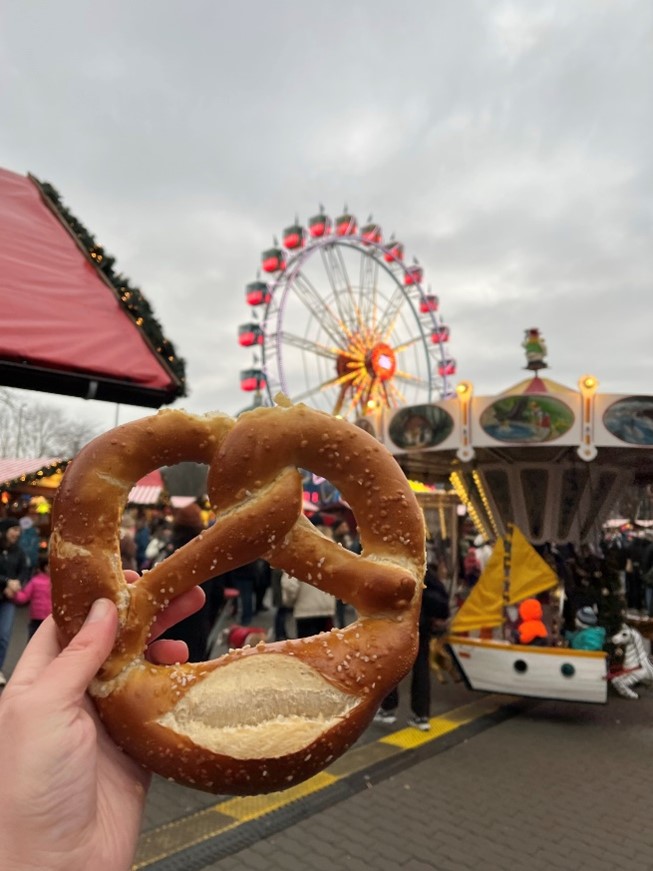 Trying a traditional pretzel.