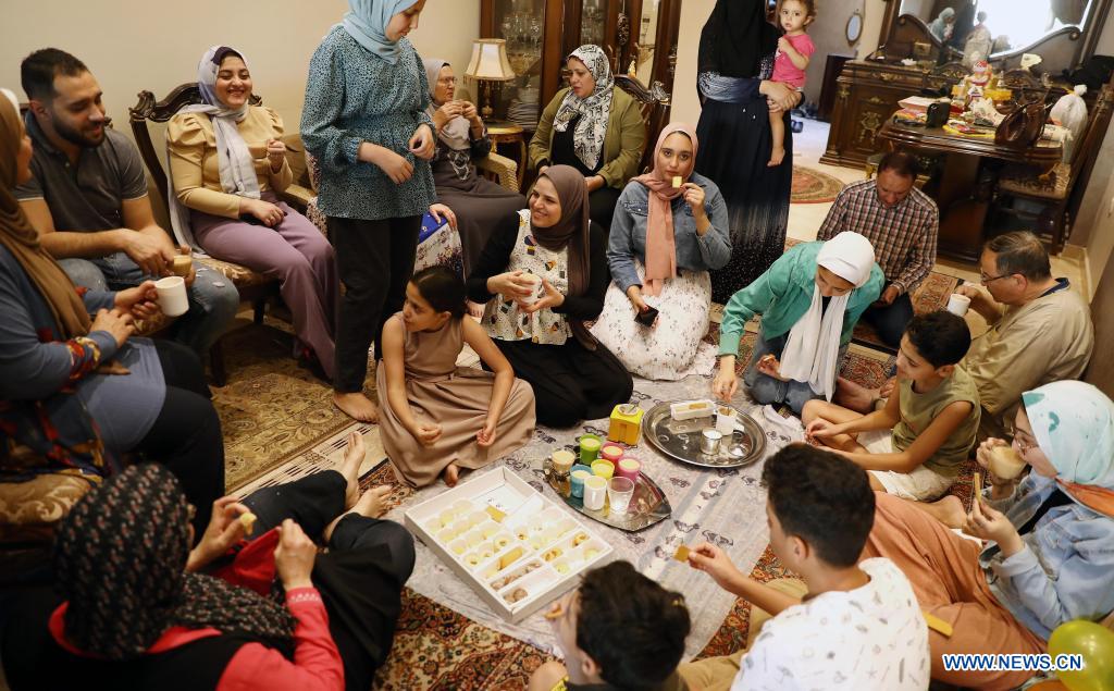 Families gathering around for Eid in Egypt (Xinhua/Ahmed Gomaa).