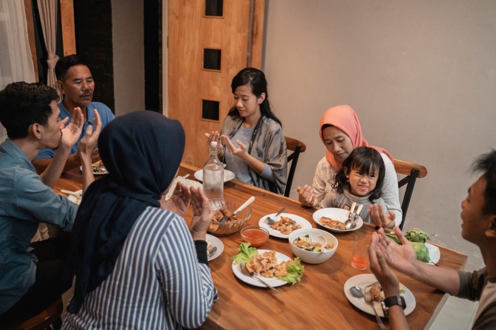 A Malaysian family waiting to have their Iftar meal during Ramadan (Homage).