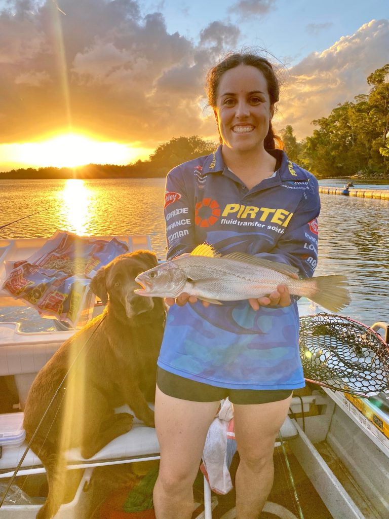 Megan and the Jewfish she caught in her hometown on the Nambucca River.