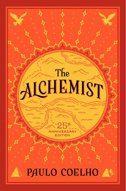 The cover of the book 'The Alchemist' by Paulo Coelho.