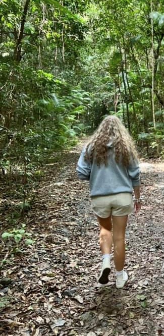 Woman walking away from the camera.