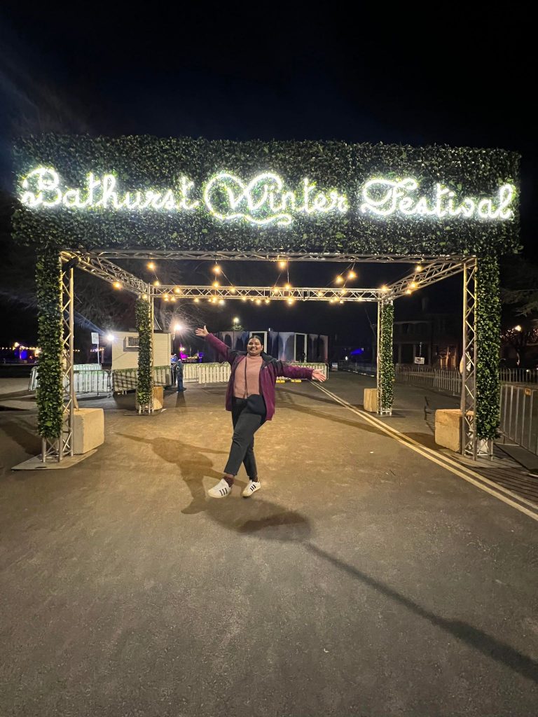 Shristi at the iconic Bathurst Winter Festival entrance.